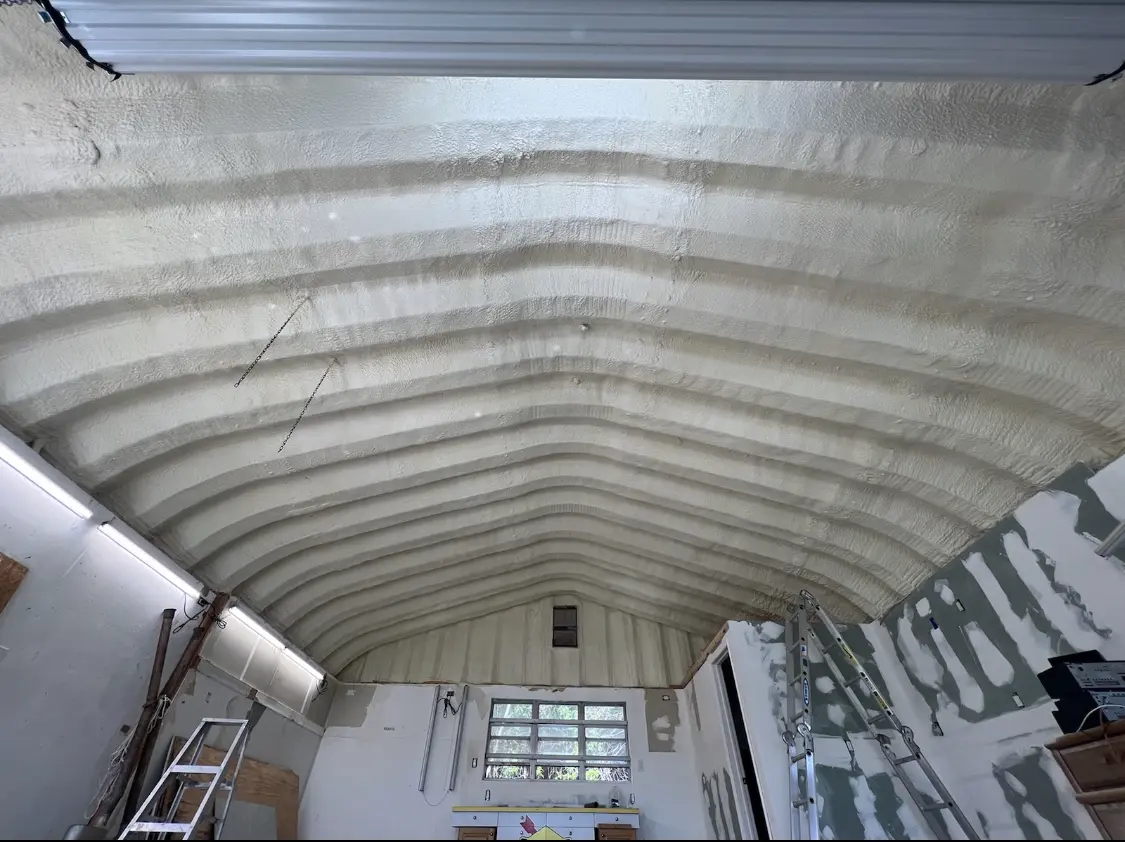 Spray polyurethane foam applied to the underside of a metal roof deck in Miami Gardens